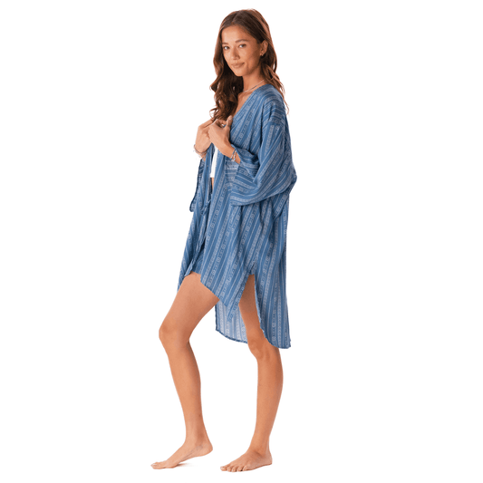Blue Striped Kimono Cover up with 3/4 sleeves and side slits, styled as a beach cover up over swimwear. Lightweight boho kimono cardigan for summer.