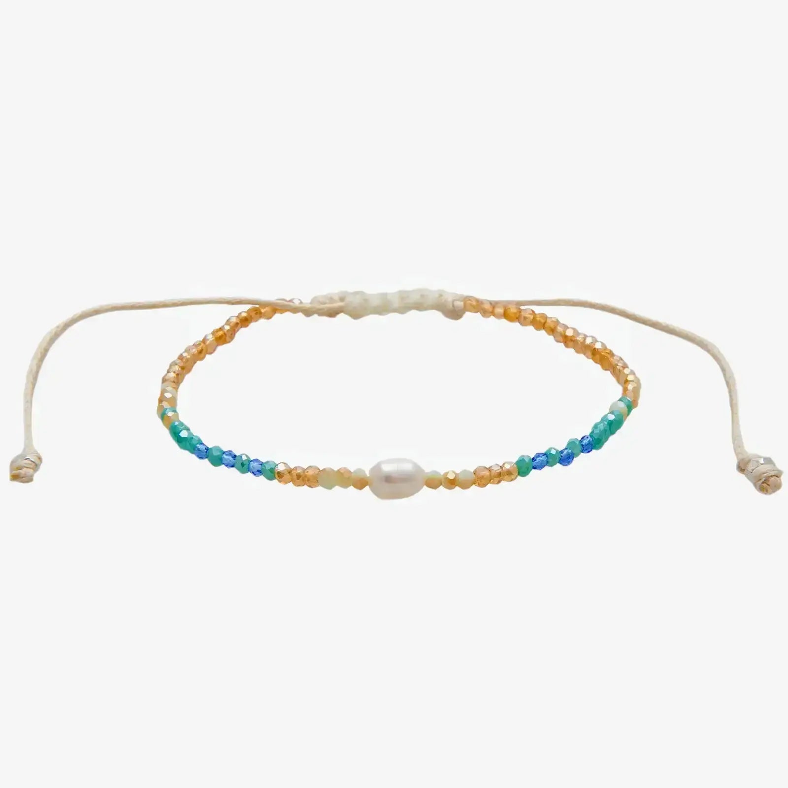 Lotus and Luna  "Make Waves" Goddess Bracelet with white pearl in center surrounded by blue, green and gold crystal beads