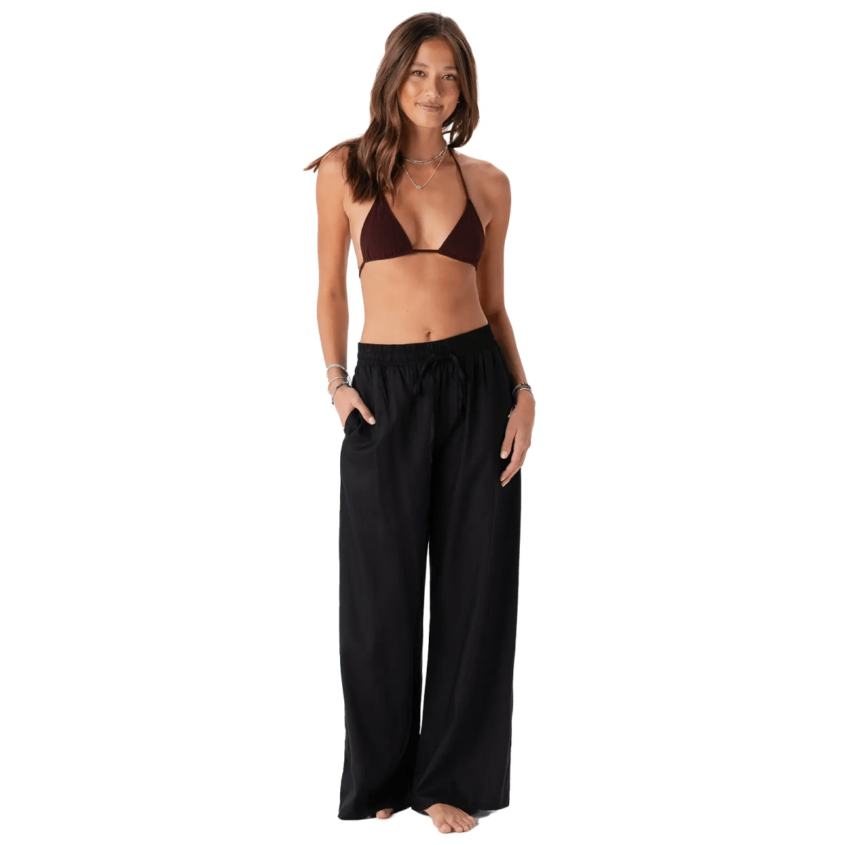 black wide leg pants with pockets and drawstring high-rise waist on model