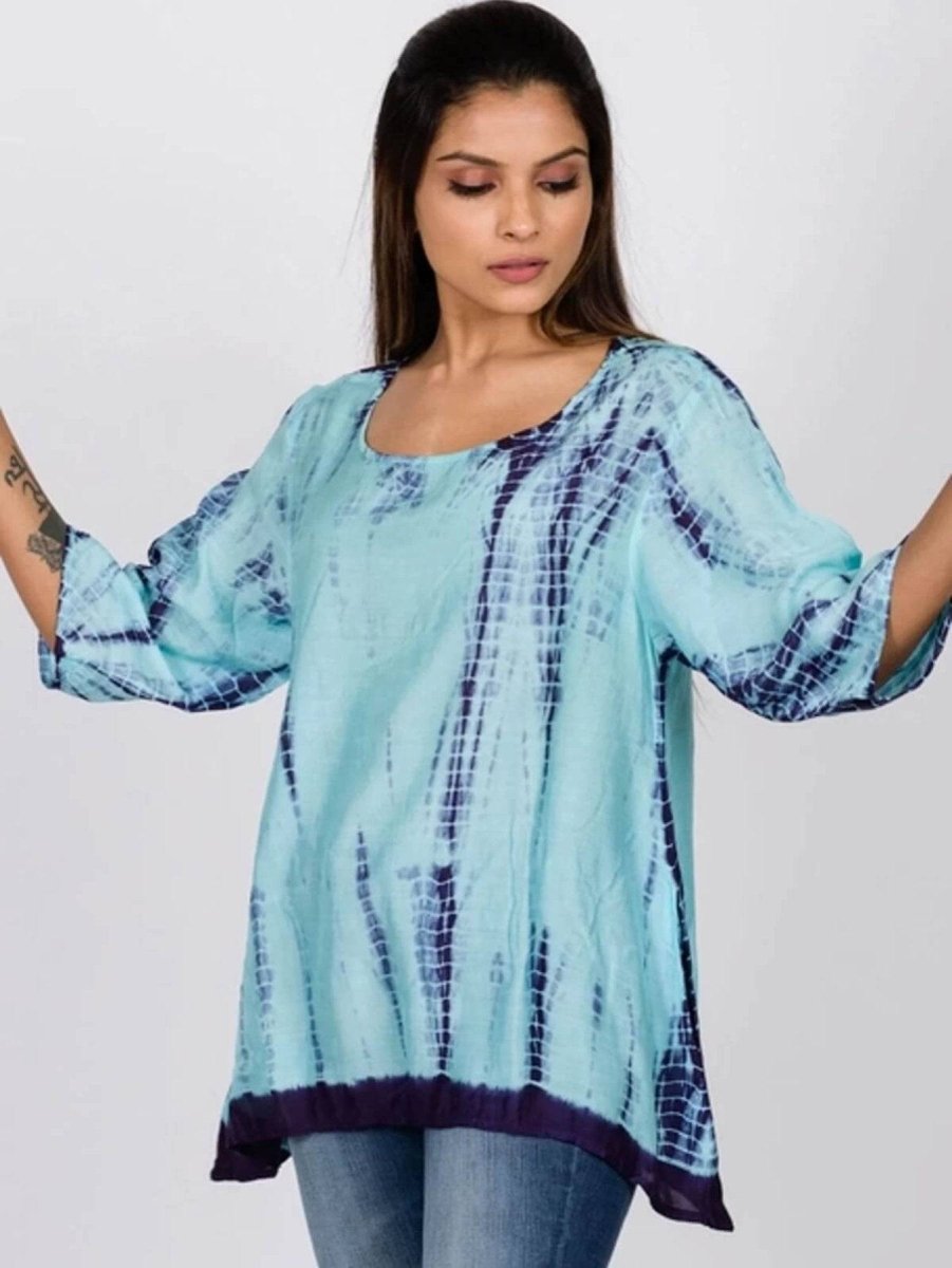 woman wearing blue tie dye tunic top from sevya