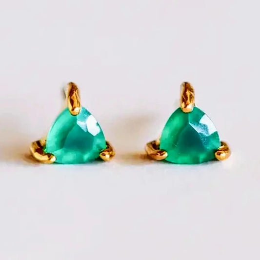 a pair of green onyx stud earrings on a white surface