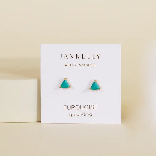 a pair of blue turquoise gold stud earrings