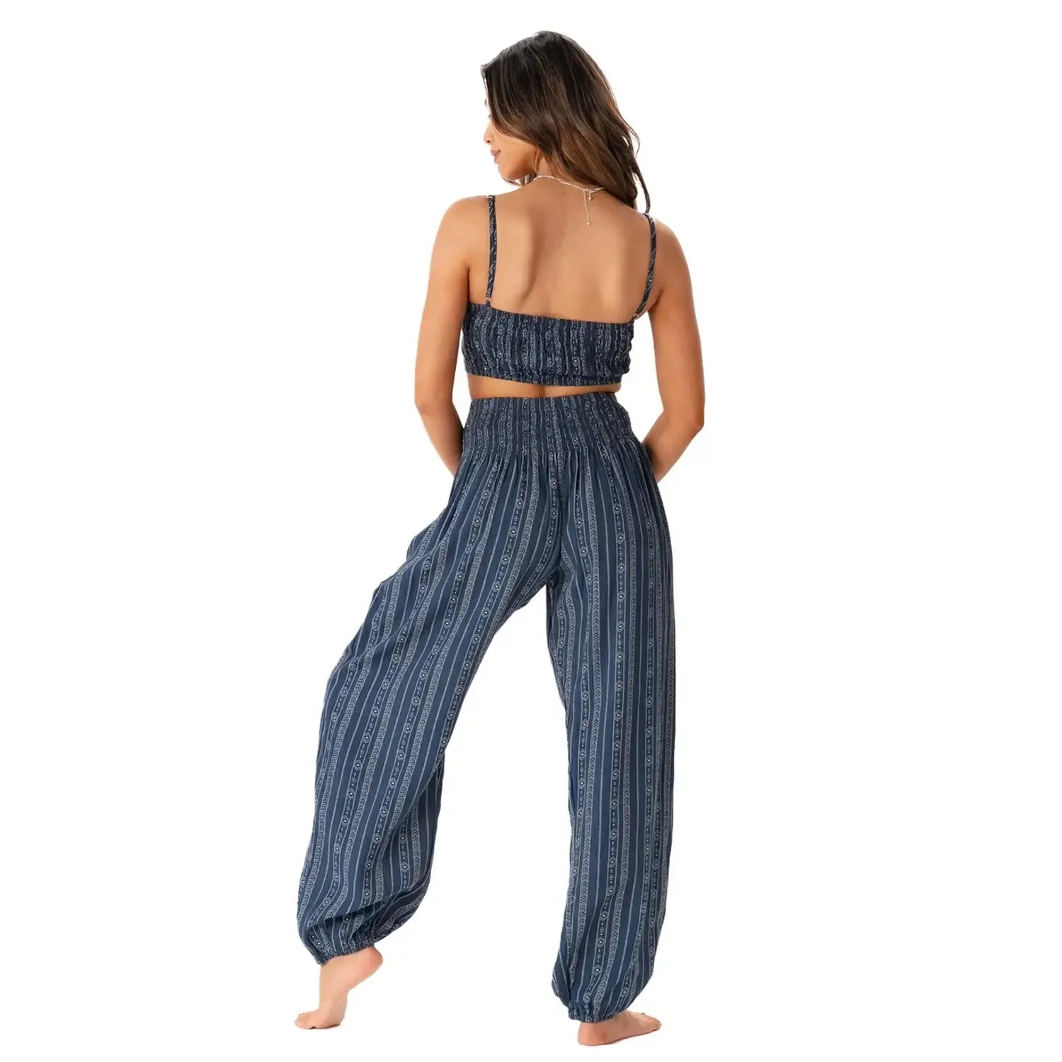 back view of striped high rise pull-on boho pants, harem style pants with tribal stripe