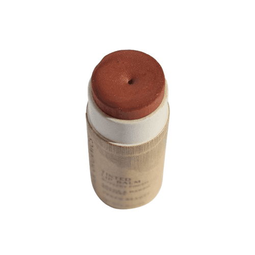 Organic Nude Lip Balm in eco-friendly tube with tinted vegan formula for long-lasting hydration and natural lip color enhancement.