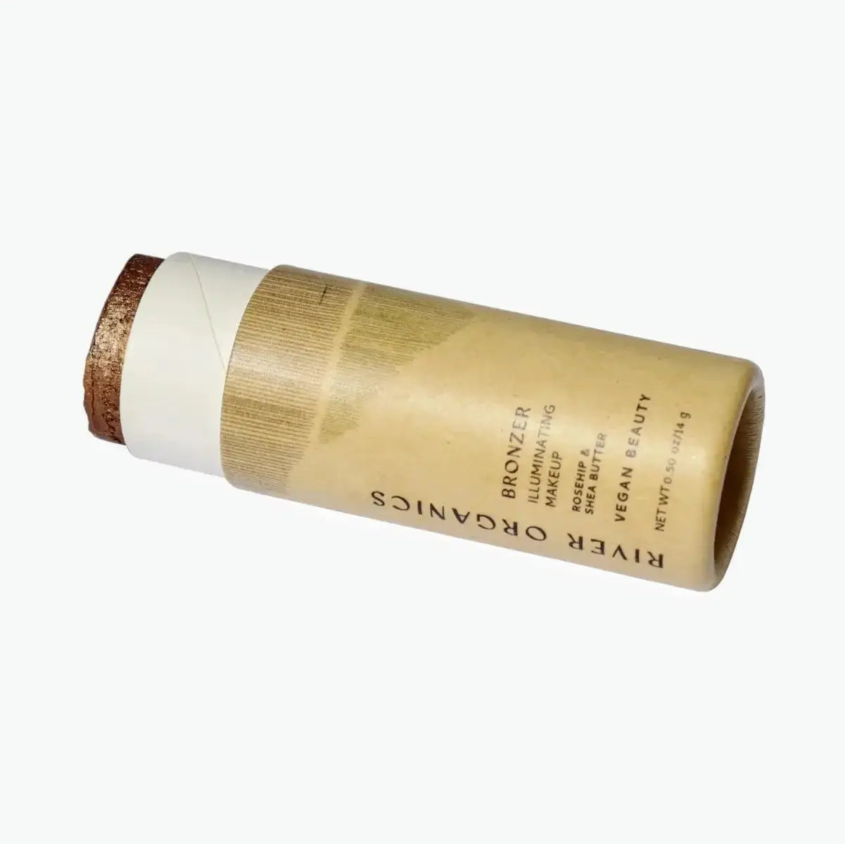 cream bronzer stick in an eco-friendly  paper tube from river organics