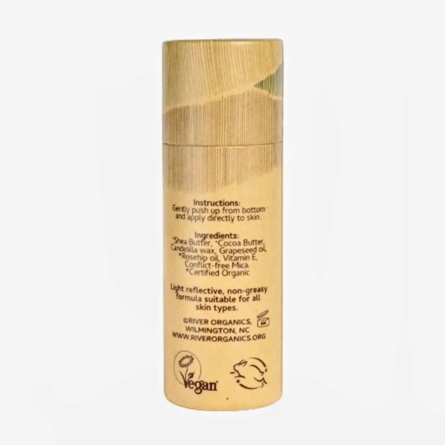 cream bronzer tube with ingredients, instructions and sustainability logos on a white background