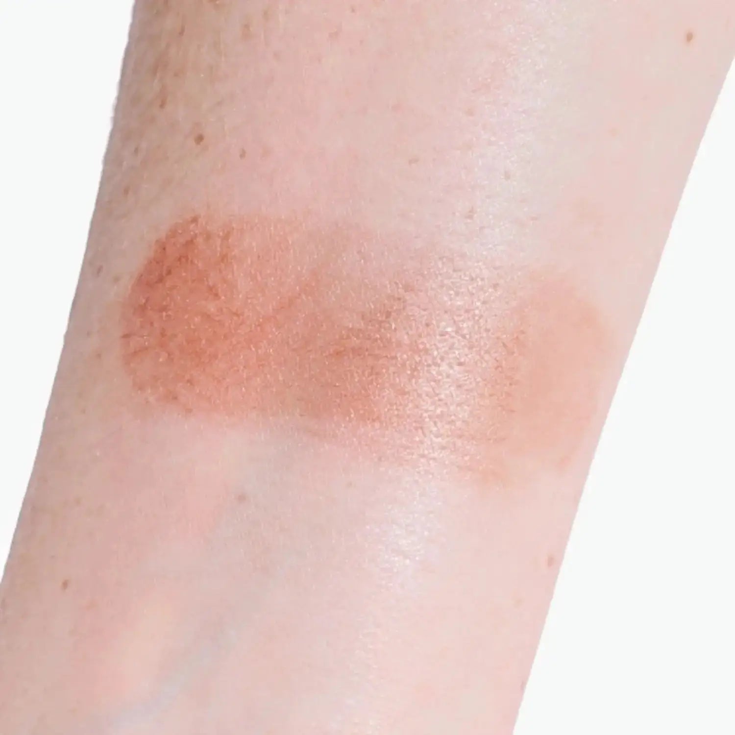 cream bronzer from river organics makeup shown on fair skin