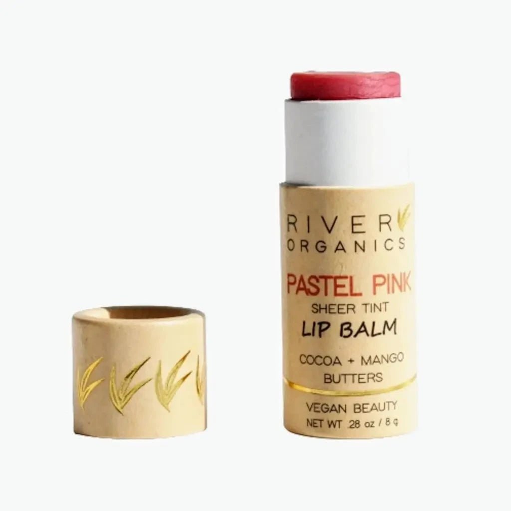 organic tinted lip balm in pastel pink color in a sustainable tube
