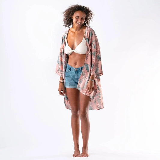 woman wearing kimono beach cover-up top over bikini top