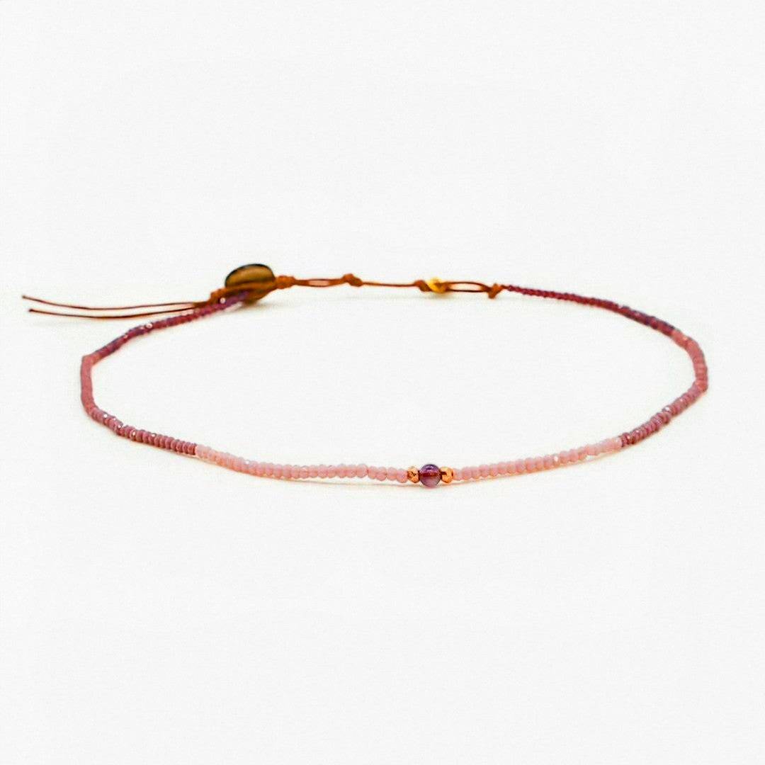 Purple Amethyst Crystal Intention Necklace with delicate pink and purple seed beads and central round amethyst stone for inner peace and balance.