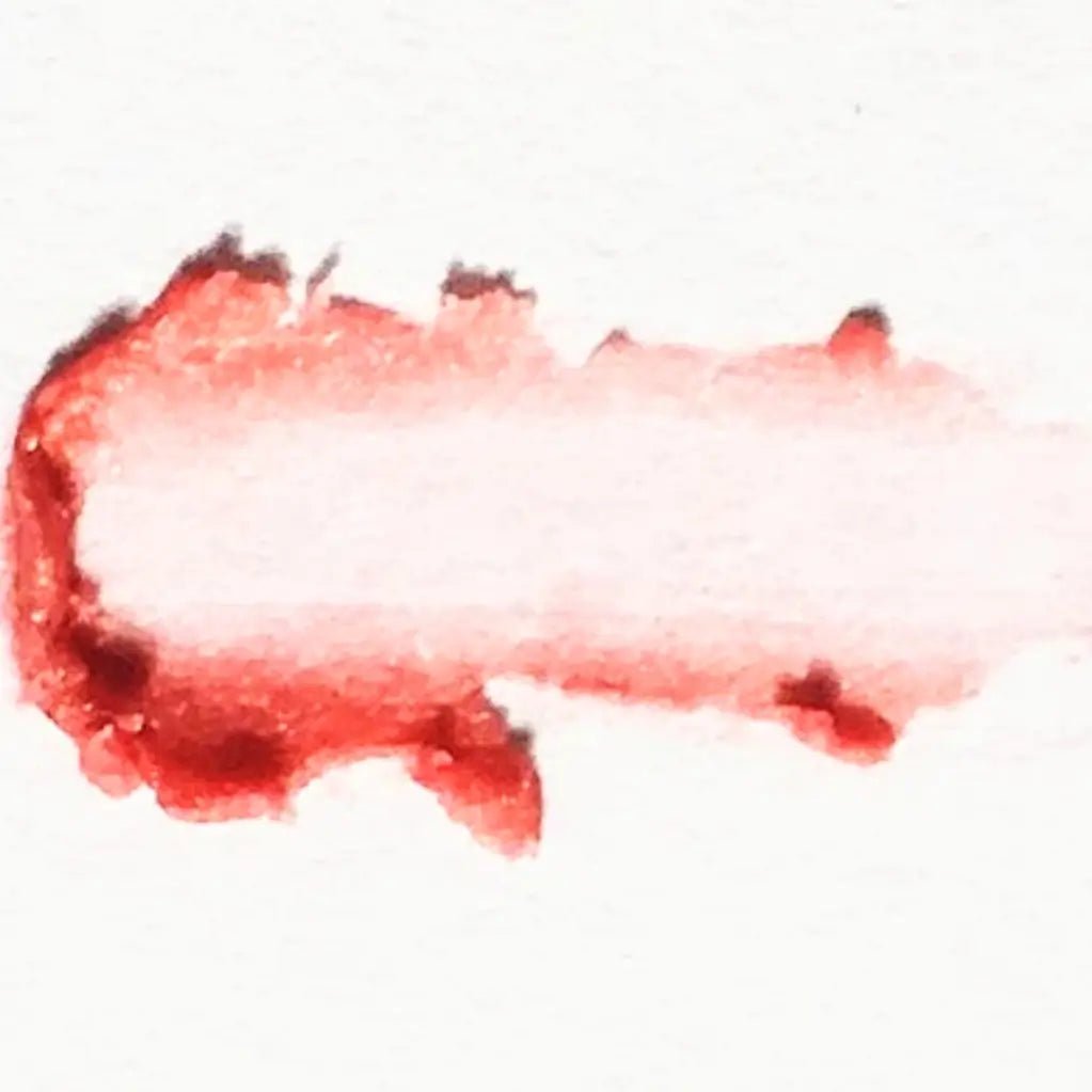 a swatch of rose pink pastel tinted lip balm