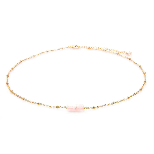 a pink Raw Rose Quartz Gold Necklace with center Stone on a yellow gold adjustable link chain with lobster claw closure