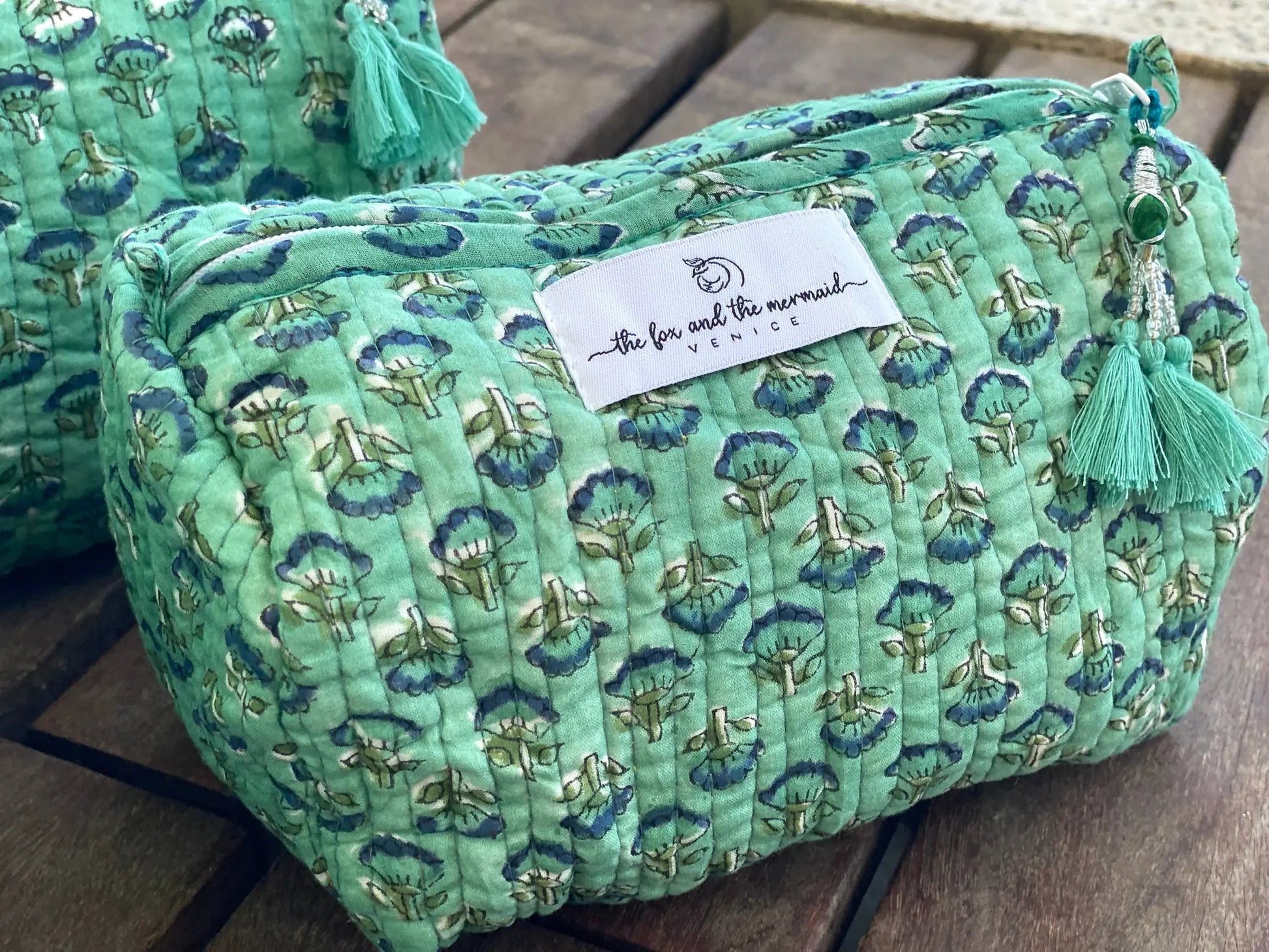 quilted cotton green floral cosmetic bag with tassel