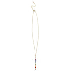 7 chakras healing necklace. Full view of 7 Chakras Necklace with adjustable yellow gold chain and colorful gemstones.