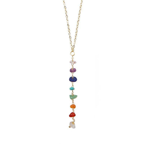 7 Chakras Necklace with raw gemstone beads on a yellow gold chain, aligned vertically to represent each chakra energy center.