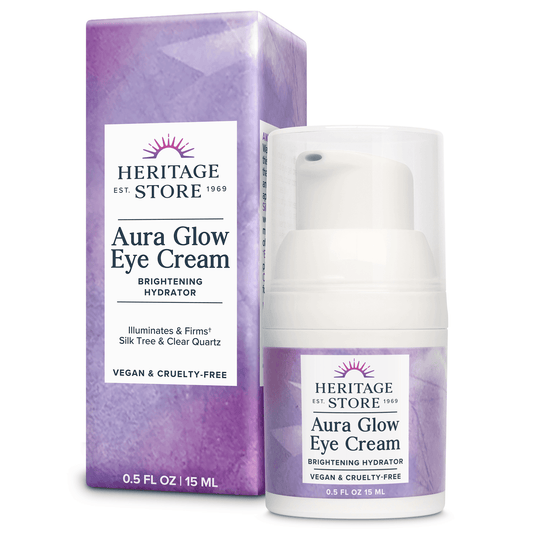 Aura Glow Eye Cream by Heritage Store in 0.5 fl oz pump bottle with box packaging. Brightening formula for dark circles and under-eye firming.