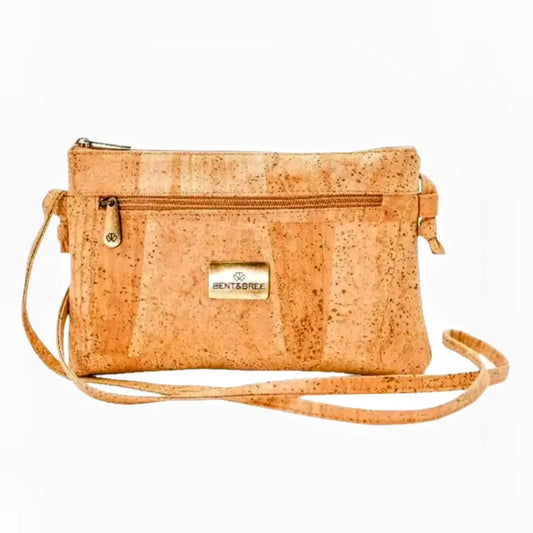 natural colored cork crossbody bag with front zippered pocket, zippered top and long shoulder strap