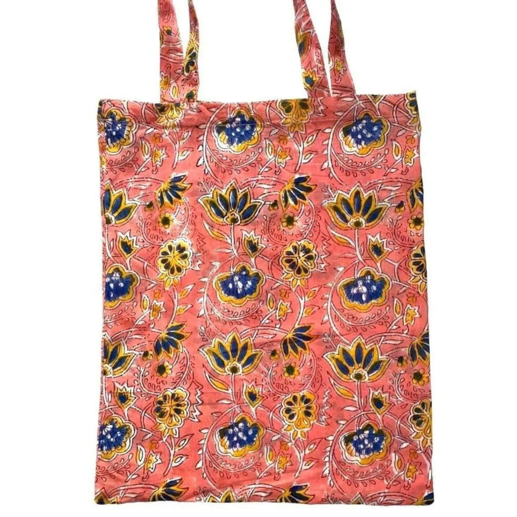 Pink floral women's pajama set by the Fox and the Mermaid with matching bag.