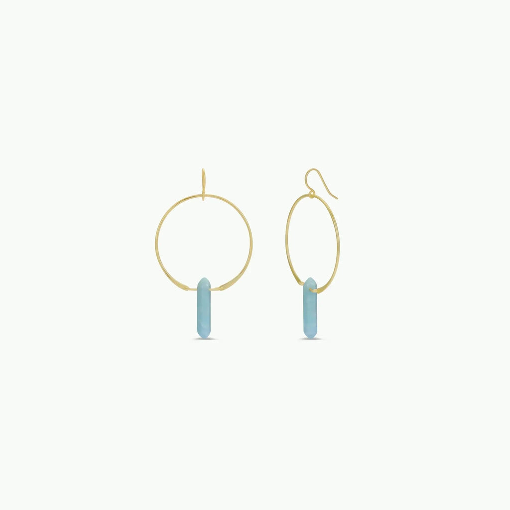Yellow gold hoop earrings with light blue-green cylindrical amazonite charms on a white background