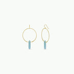 Yellow gold hoop earrings with light blue-green cylindrical amazonite charms on a white background