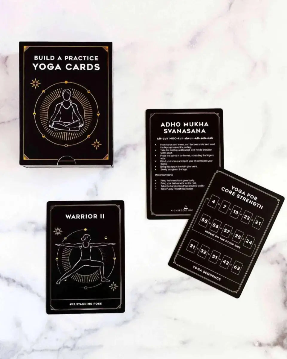 Set of yoga practice cards and yoga flash cards on a marble surface by High Desert Yogi