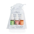 Botanical Facial Serum Discovery Gift Set by Kuumba Made in sheer white pouch with three travel-size serums for all skin types.