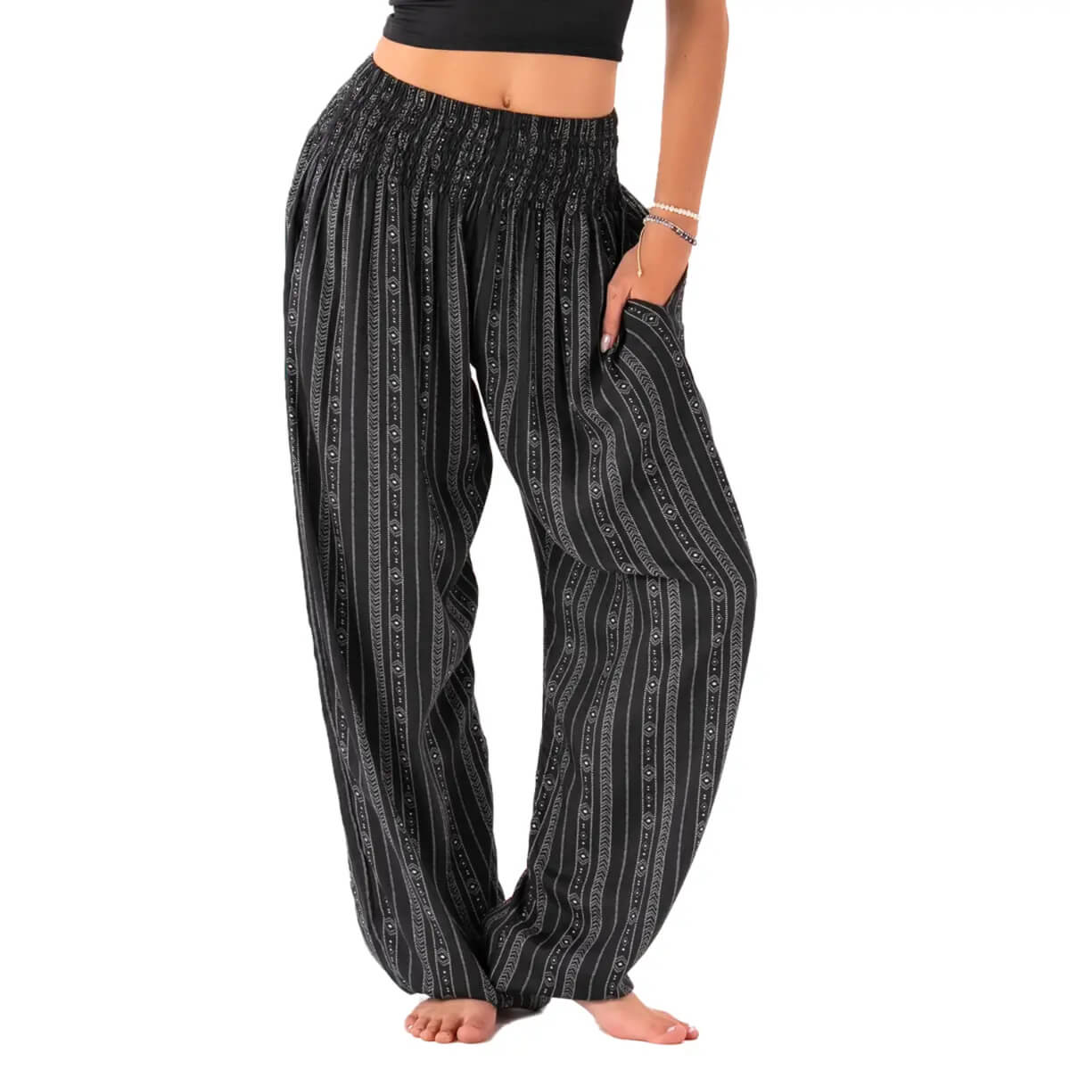 Striped Black Boho Harem Pants with Pockets by Lotus and Luna, featuring a relaxed fit and smocked waistband for casual comfort.