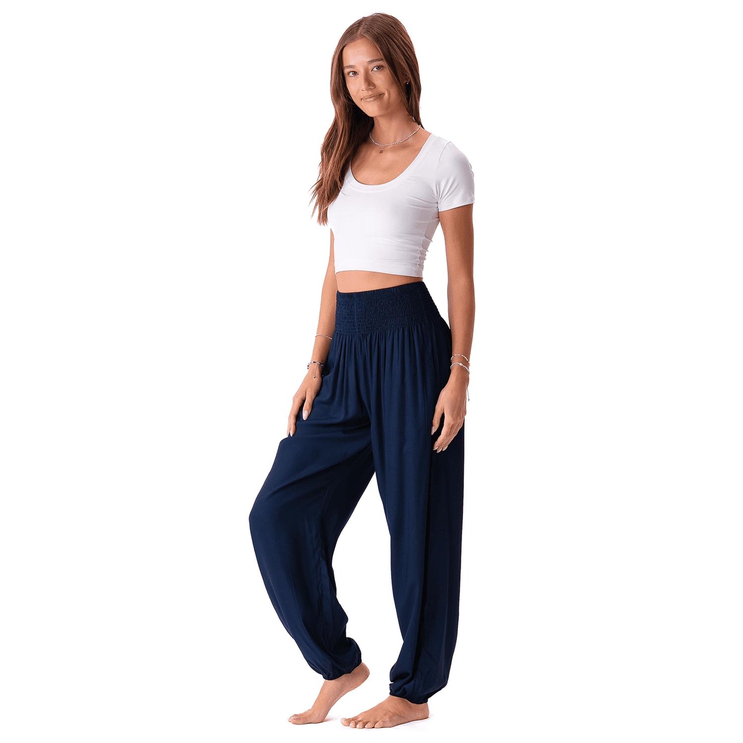 Side view of Lotus and Luna Harem Pants XL in navy, highlighting the flowy silhouette and soft, breathable material.