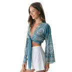 Sapphire Beach Daydreamer Bell Sleeve Top featuring boho mandala patterns, tie-front closure, and flowing bell sleeves.