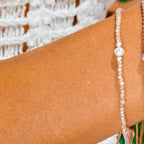 bracelet with white center freshwater pearl surrounded by white crystals