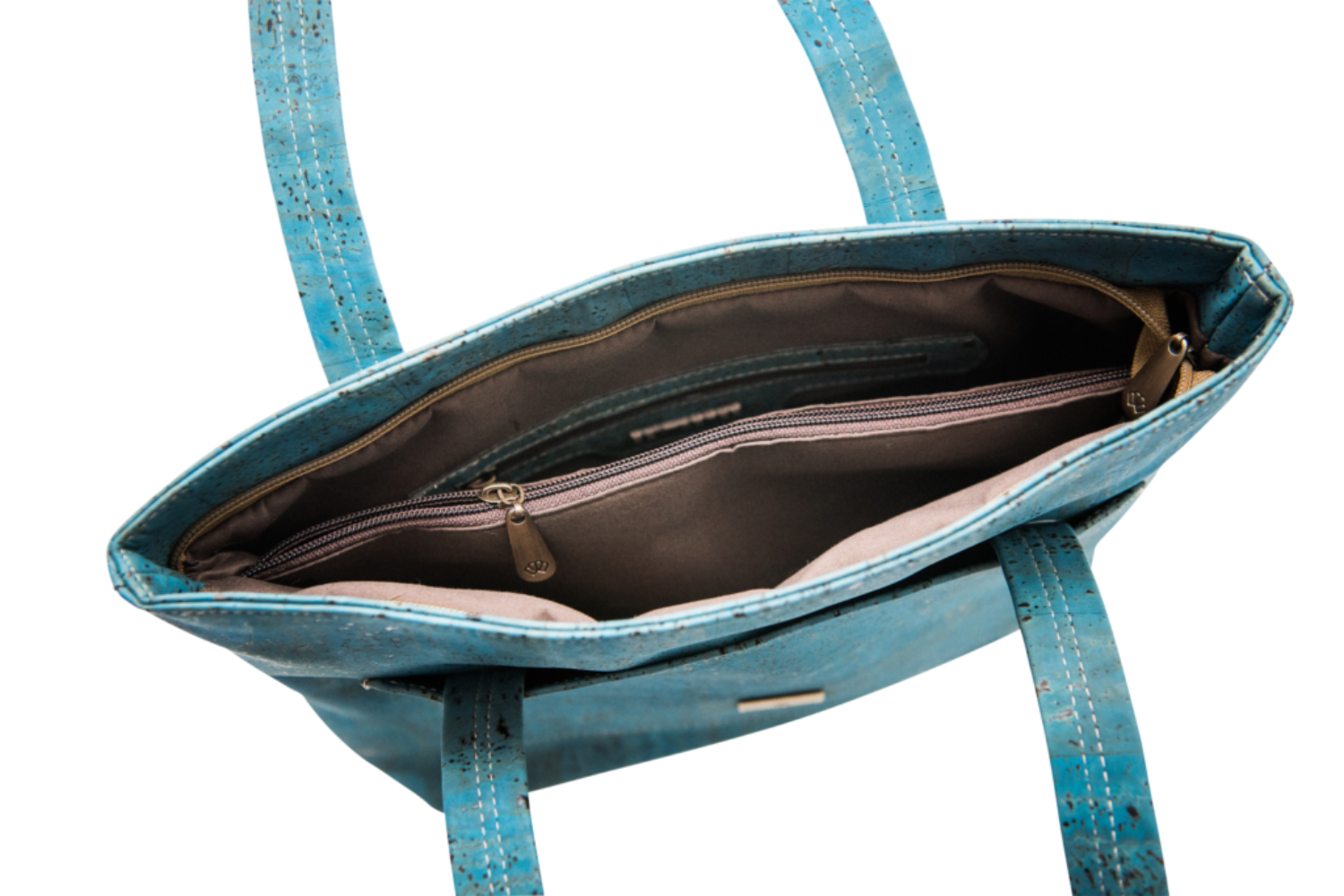 Interior view of Grace Peacock Blue Handbag showing zippered compartment and organized pockets, perfect for daily essentials.
