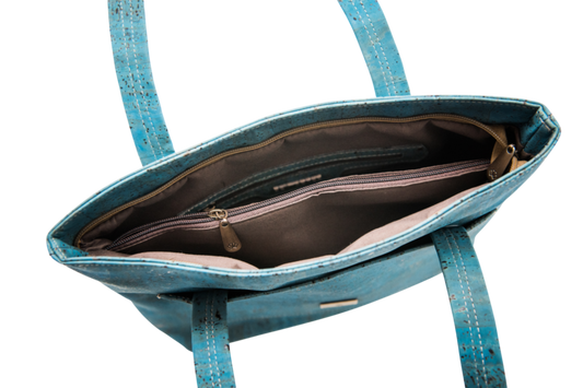 Interior view of Grace Peacock Blue Handbag showing zippered compartment and organized pockets, perfect for daily essentials.