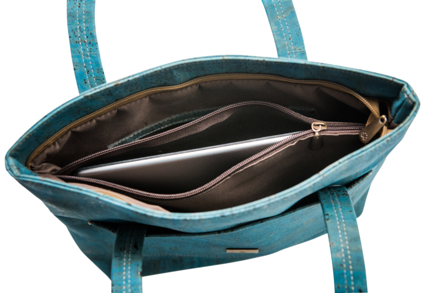 Grace Peacock Blue Handbag open top view with laptop inside, highlighting spacious interior and secure zippered section.