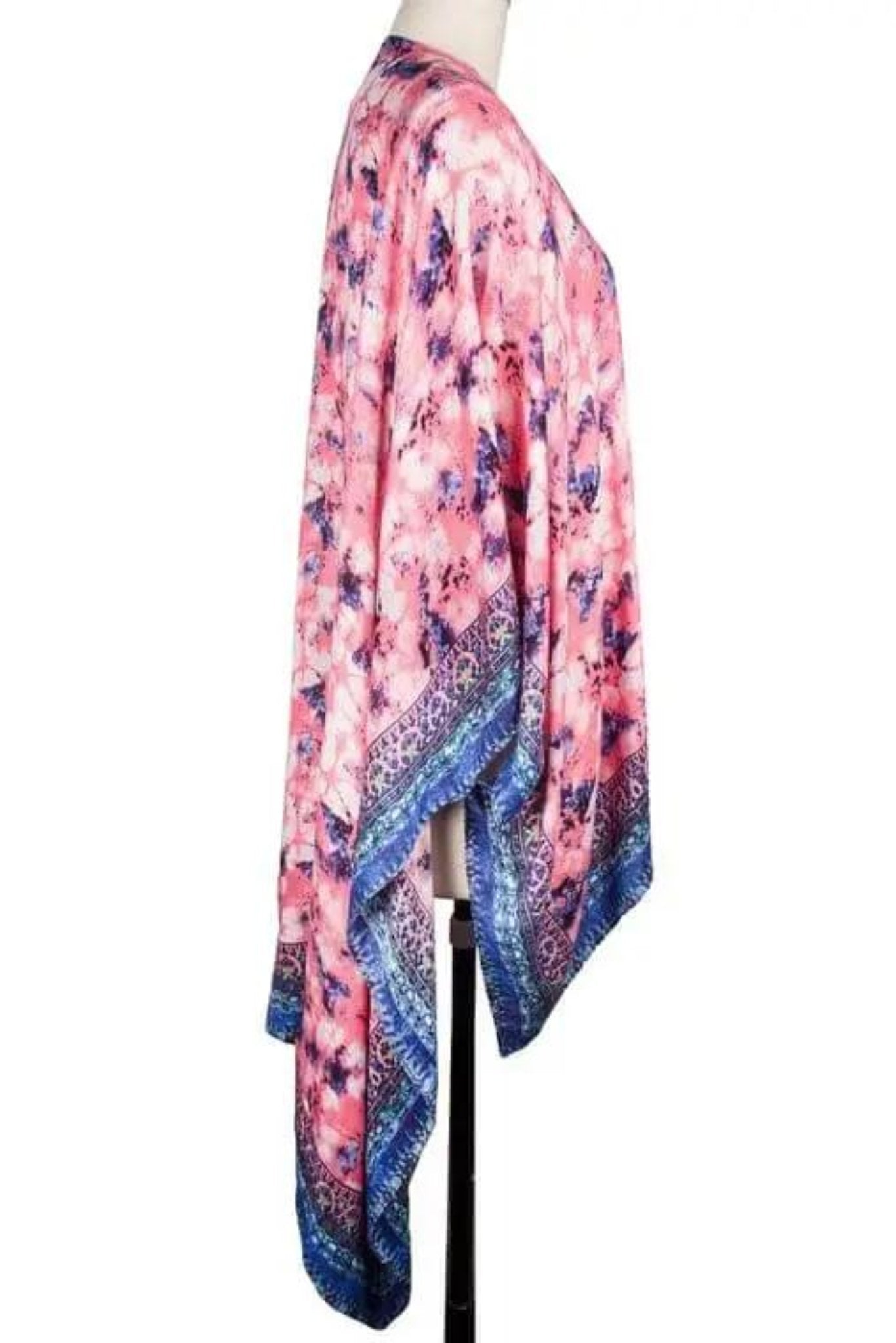a pink and blue kimono on a mannequin