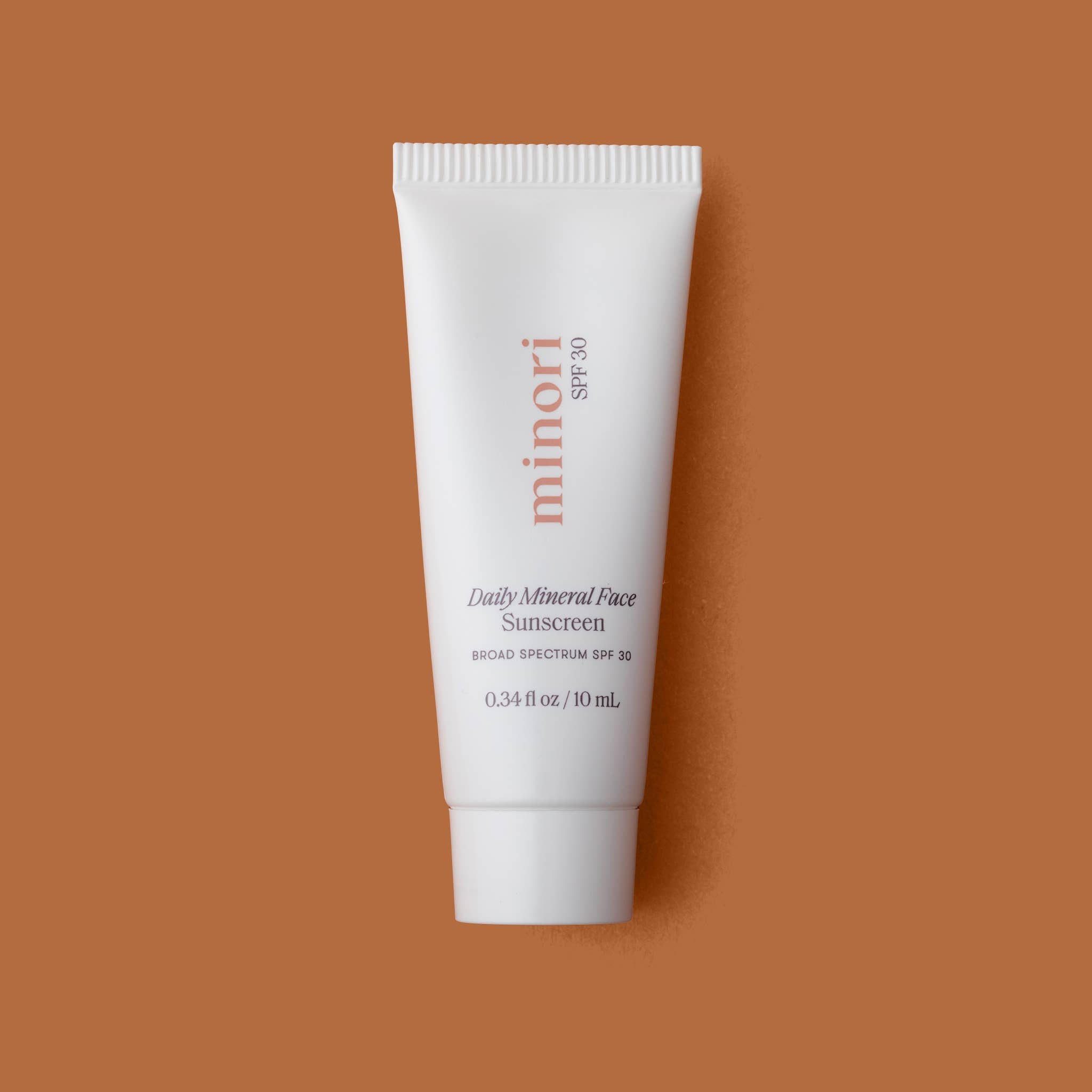Smoothing Face Primer Mineral Sunscreen with SPF 30 in a travel size tube. 