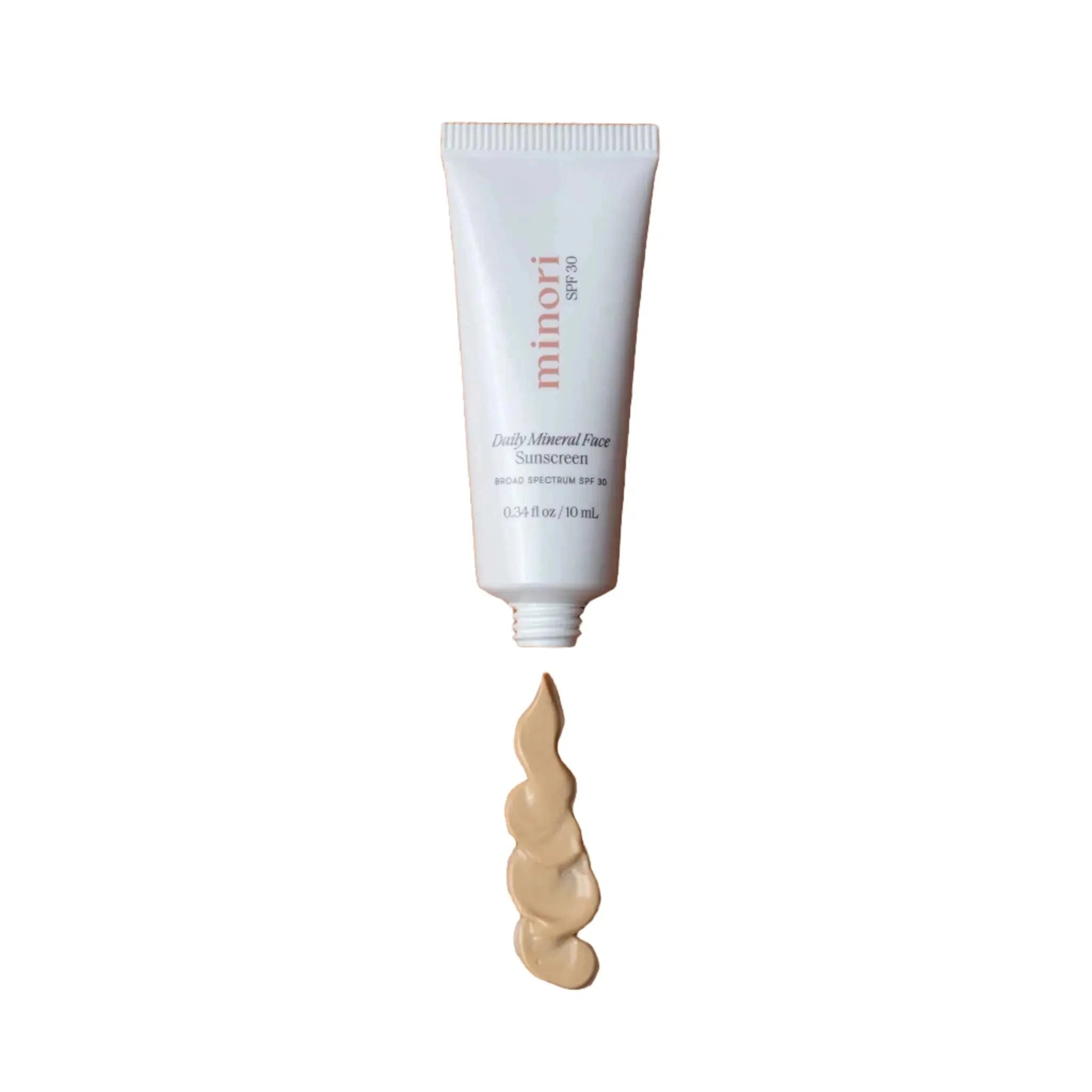 Minori Smoothing Face Primer with SPF 30 in a white tube, shown with creamy mineral sunscreen swatch on a white background. Ideal for matte makeup base.