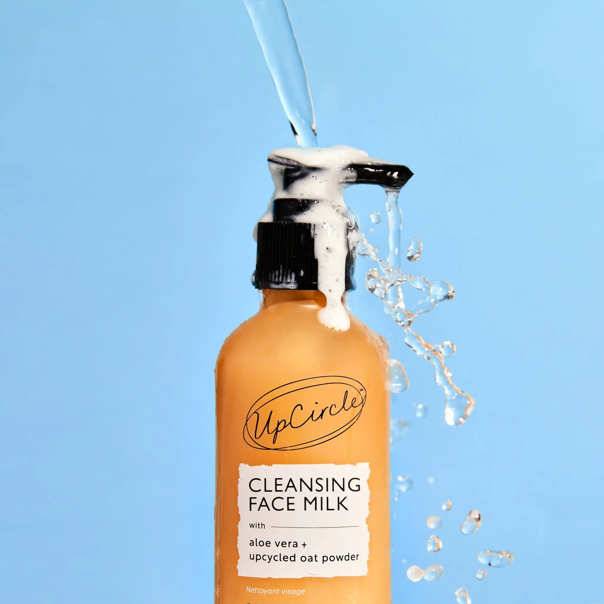 Bottle of UpCircle - Cleansing Face Milk with Aloe Vera + upcycled Oat Powder