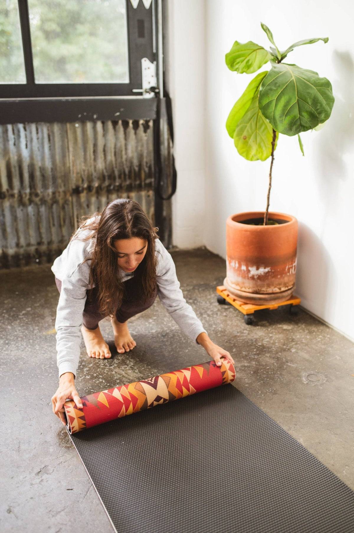 Yune Yoga X Pendleton Highland Peak Yoga and Pilates Mat inspired by the mountain summit in Sierra Nevada Mountains can be rolled up for your next adventure.
