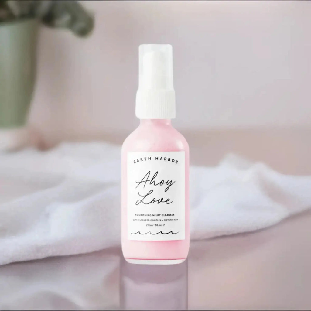 Earth Harbor Ahoy Love Daily Exfoliating Face Wash & Milky Face Cleanser in 2 oz glass bottle