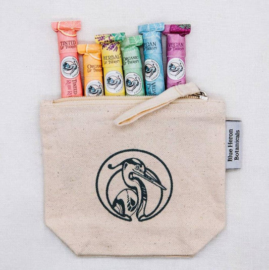 all natural lip balm gift set in canvas logo blue heron botanicals cosmetic bag