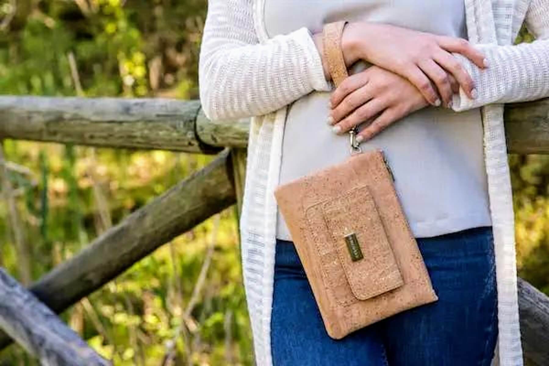 Model wearing Natural Cork Clutch Wallet a Zipper Wristlet Bag with Strap