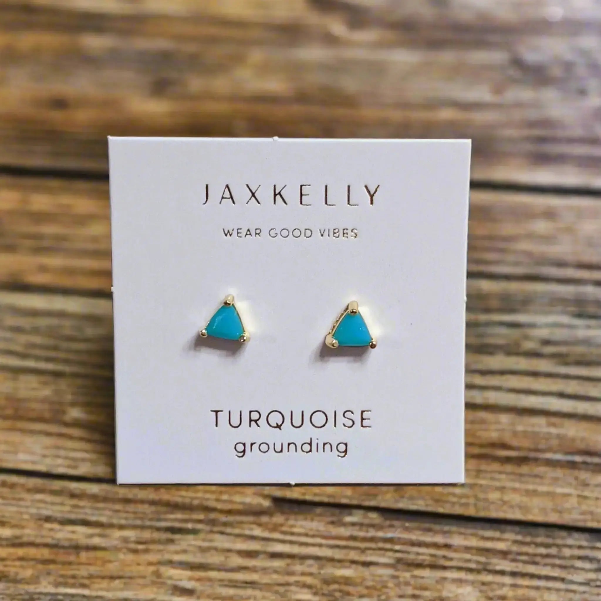 a pair of blue turquoise stud earrings