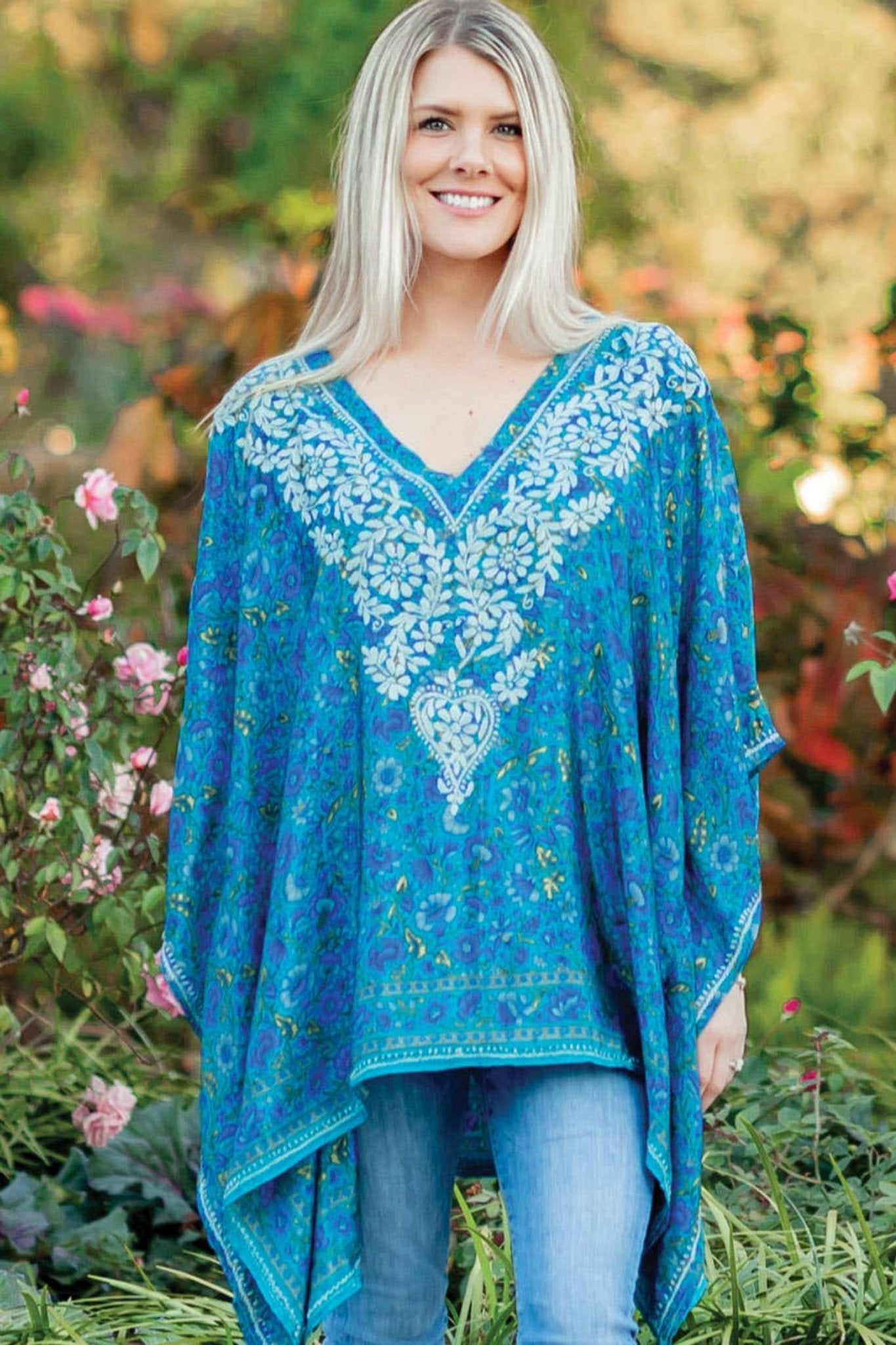 blue floral embroidered tunic boho top on model