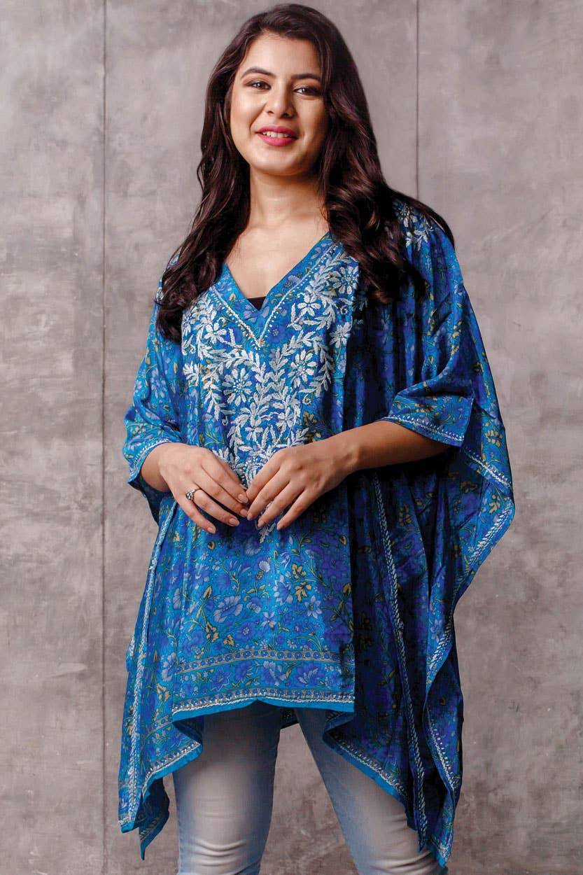 blue floral embroidered tunic boho top  on model