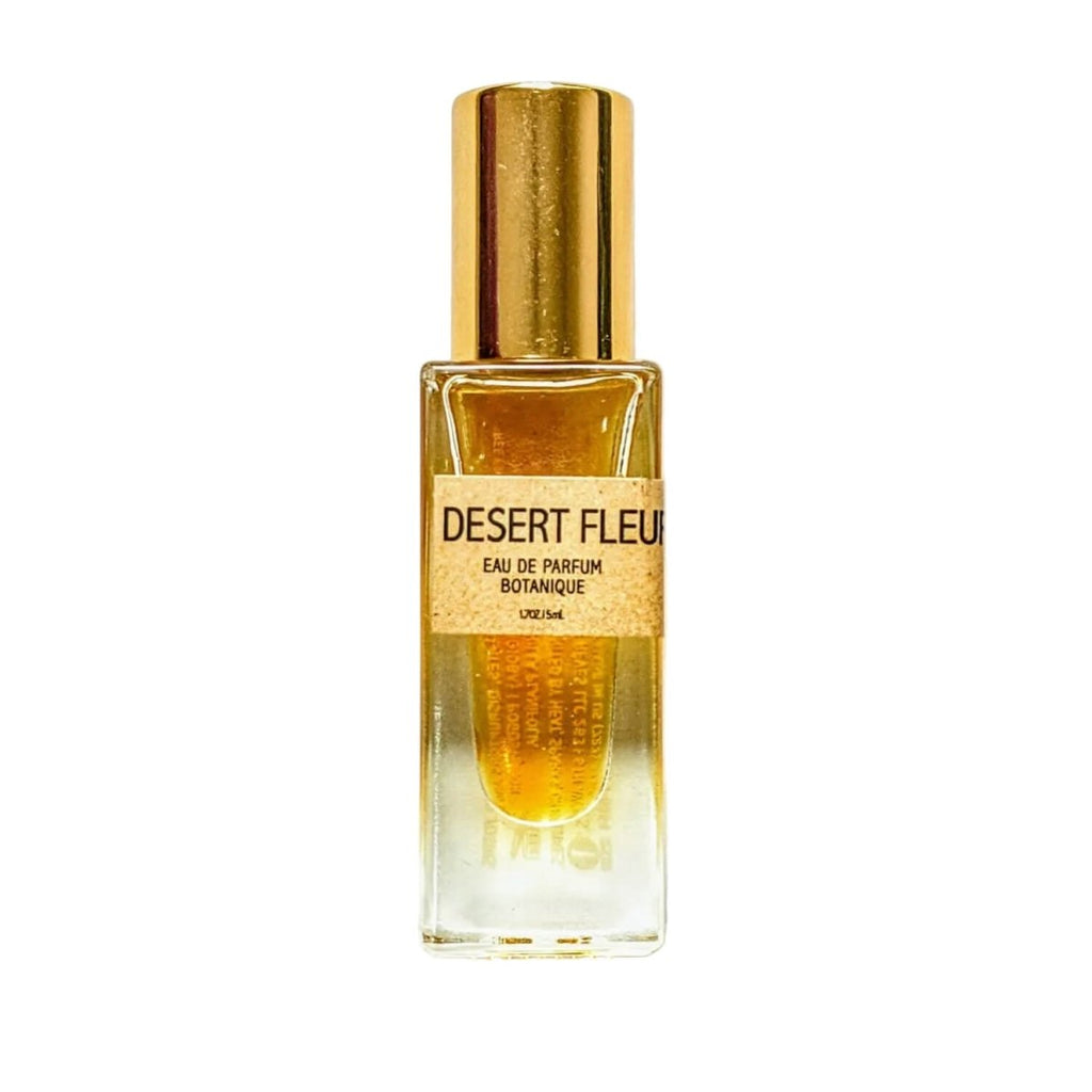 Desert Fleur perfume bottle with gold cap on a white background, a vegan friendly scent by Bohemian Reves.