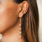 boho flower dangle earrings on model