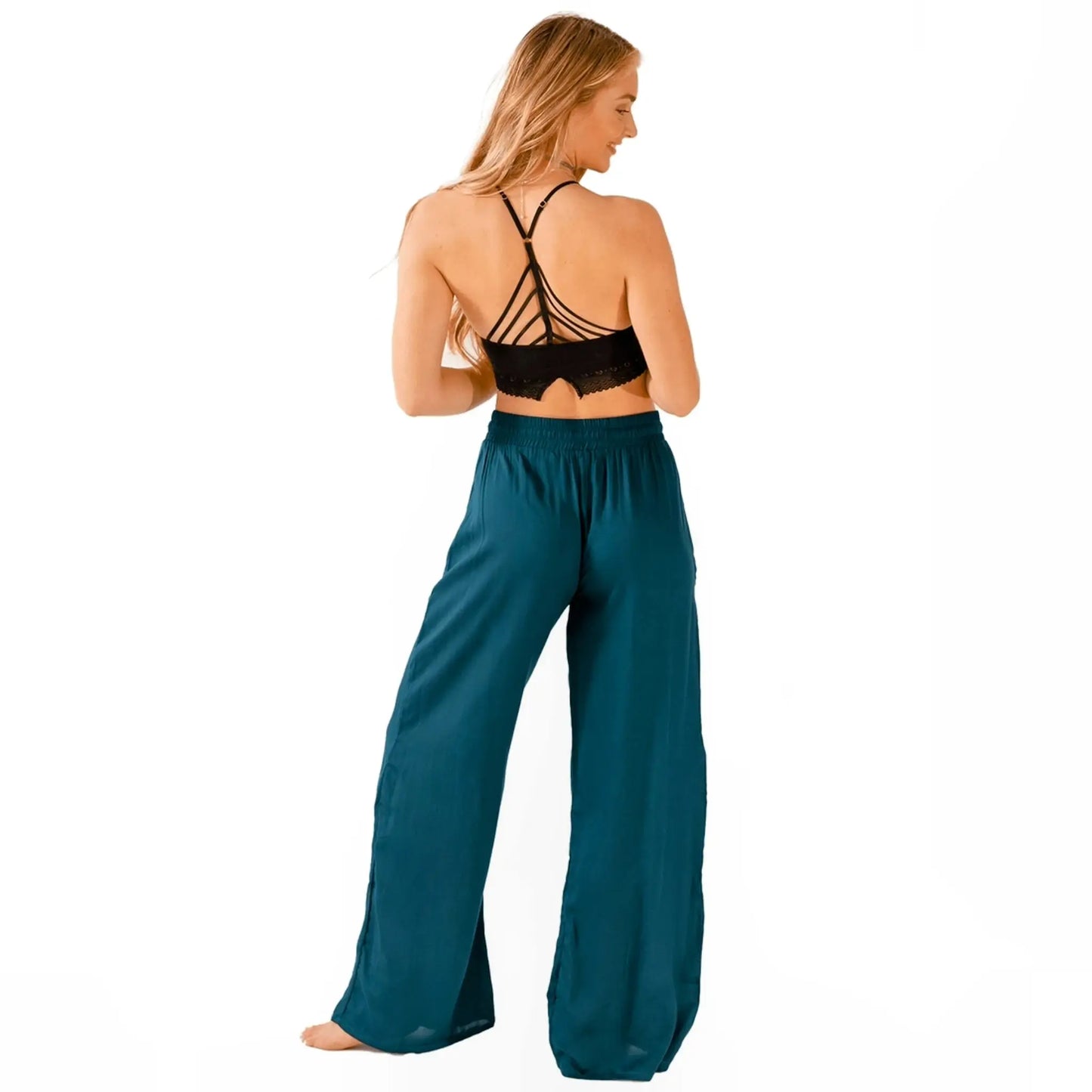 boho wide leg drawstring pants in Teal by Lotus and Luna - back view