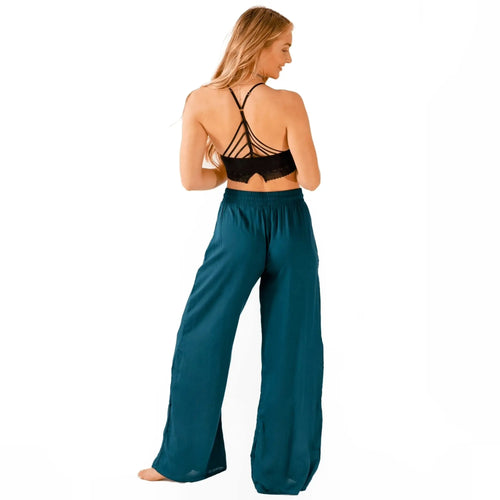 boho wide leg drawstring pants in Teal by Lotus and Luna - back view