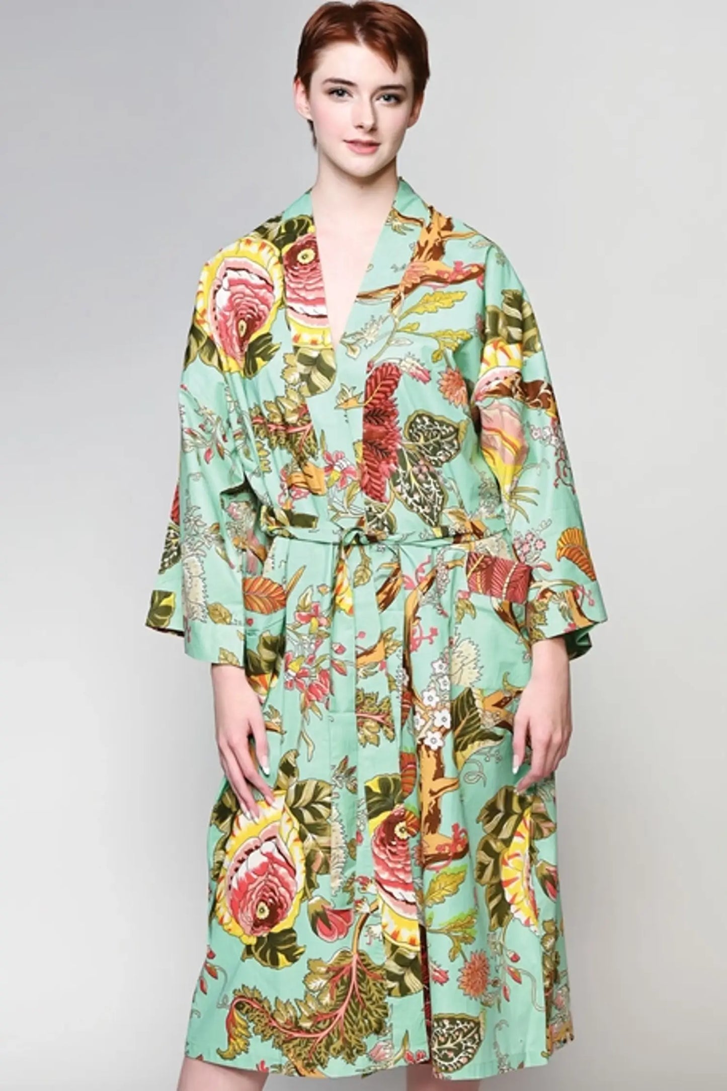 woman in green floral robe
