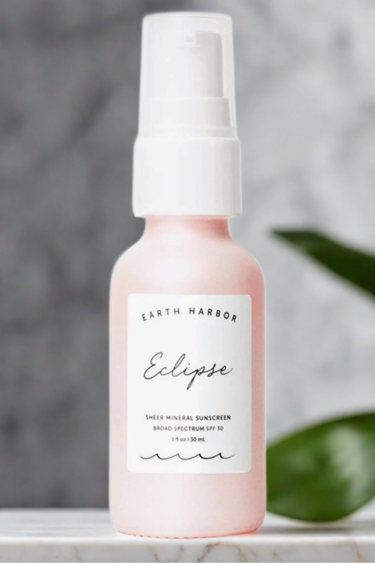 a bottle of Earth Harbor Eclipse sunscreen